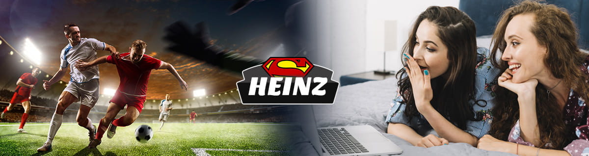 Due ragazze assistono a una partita di calcio e la scritta Super Heinz