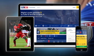 Un laptop e uno smartphone che mostrano l'app di Sky Bet, vicino a un tablet che mostra un contrasto di gioco durante una partita di calcio